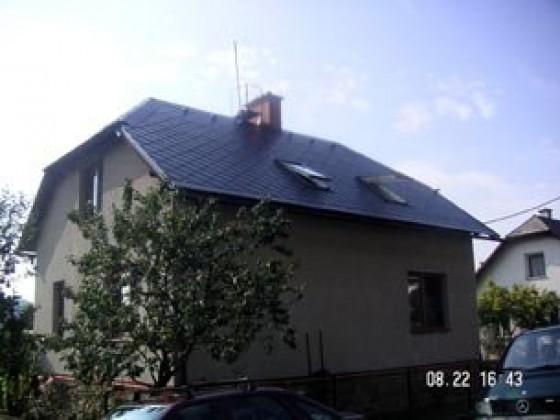 Provedení rekonstrukce střechy objektu RD v Dlouhomilově, realizace v r. 2007