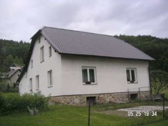 Provedení rekonstrukce střechy objektu RD v Raškově, realizace v r.2006