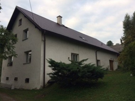 Provedení rekonstrukce střechy obytného domu Bratrušov - realizace v r. 2015